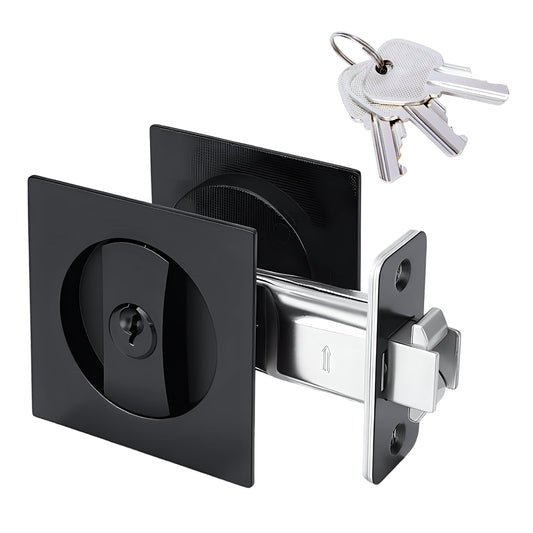 Black door lock mechanism with keys on a white background