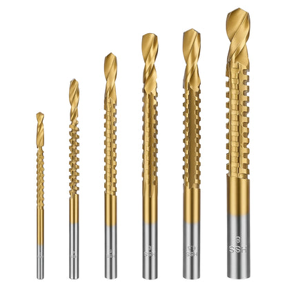 Set of six gold drill bits with silver tips on a white background