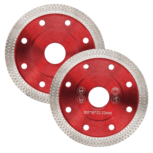 Two circular diamond saw blades with red metallic centers and textured silver outer cutting edges, shown on a plain white background. One blade is fully visible and the other is partially overlapped behind it.