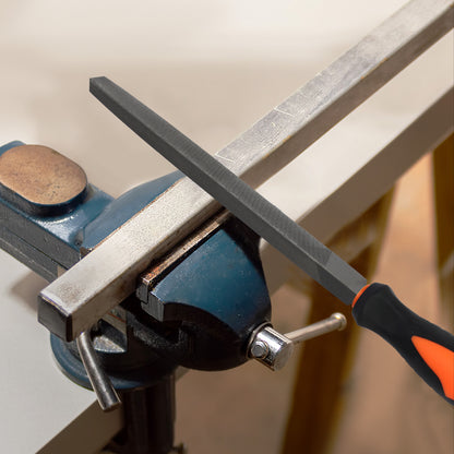 Metal file being used on a metal bar held in a vise