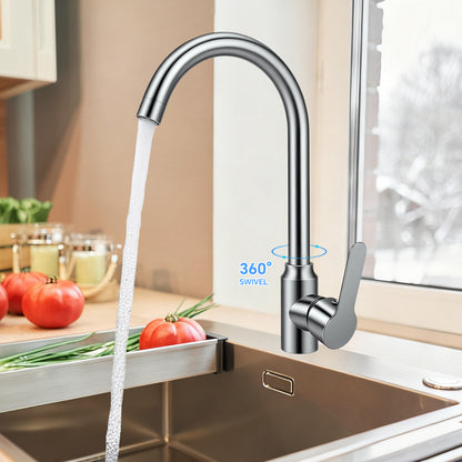 Modern kitchen faucet with water flowing in a well-lit kitchen.