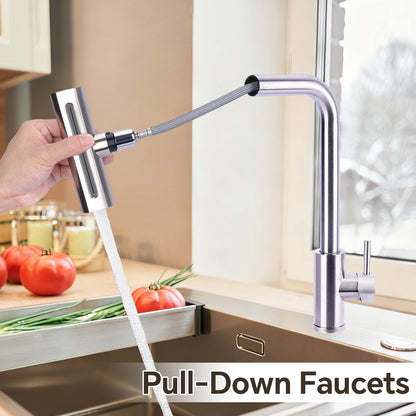 Pull-down faucet being used in a kitchen setting with tomatoes and green onions on the counter.