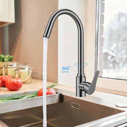 Modern kitchen faucet with water flowing into a sink, set against a kitchen background.