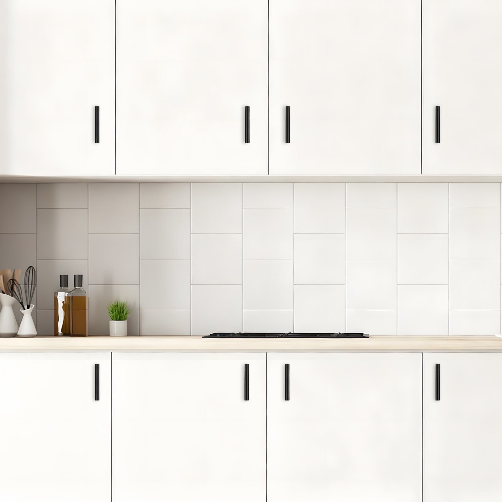 Modern kitchen with white cabinets, tiled backsplash, and countertop.