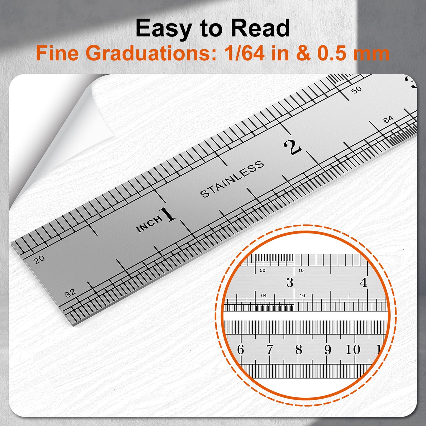 Metal ruler with fine graduations on a white background