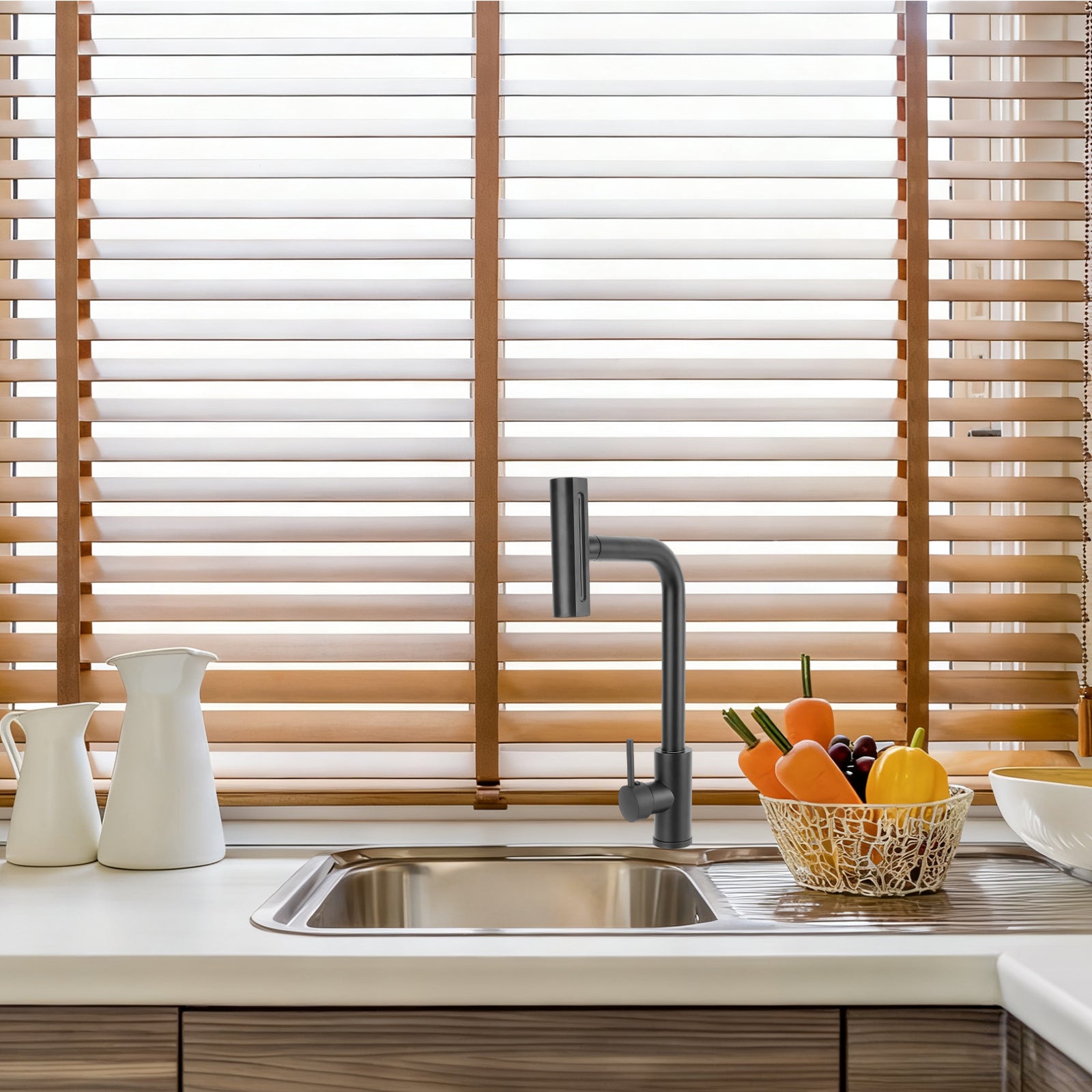 Kitchen sink with faucet and wooden blinds in the background