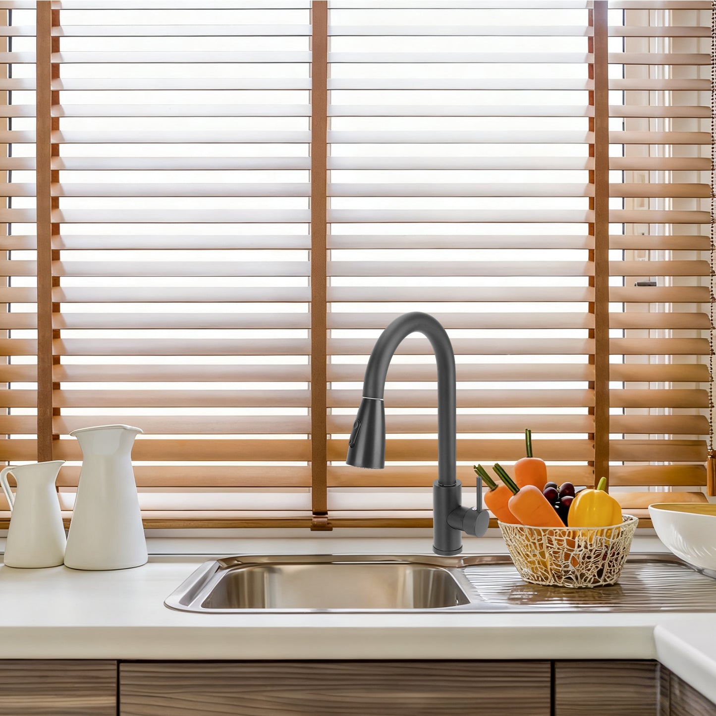 Kitchen sink with faucet and wooden blinds in the background