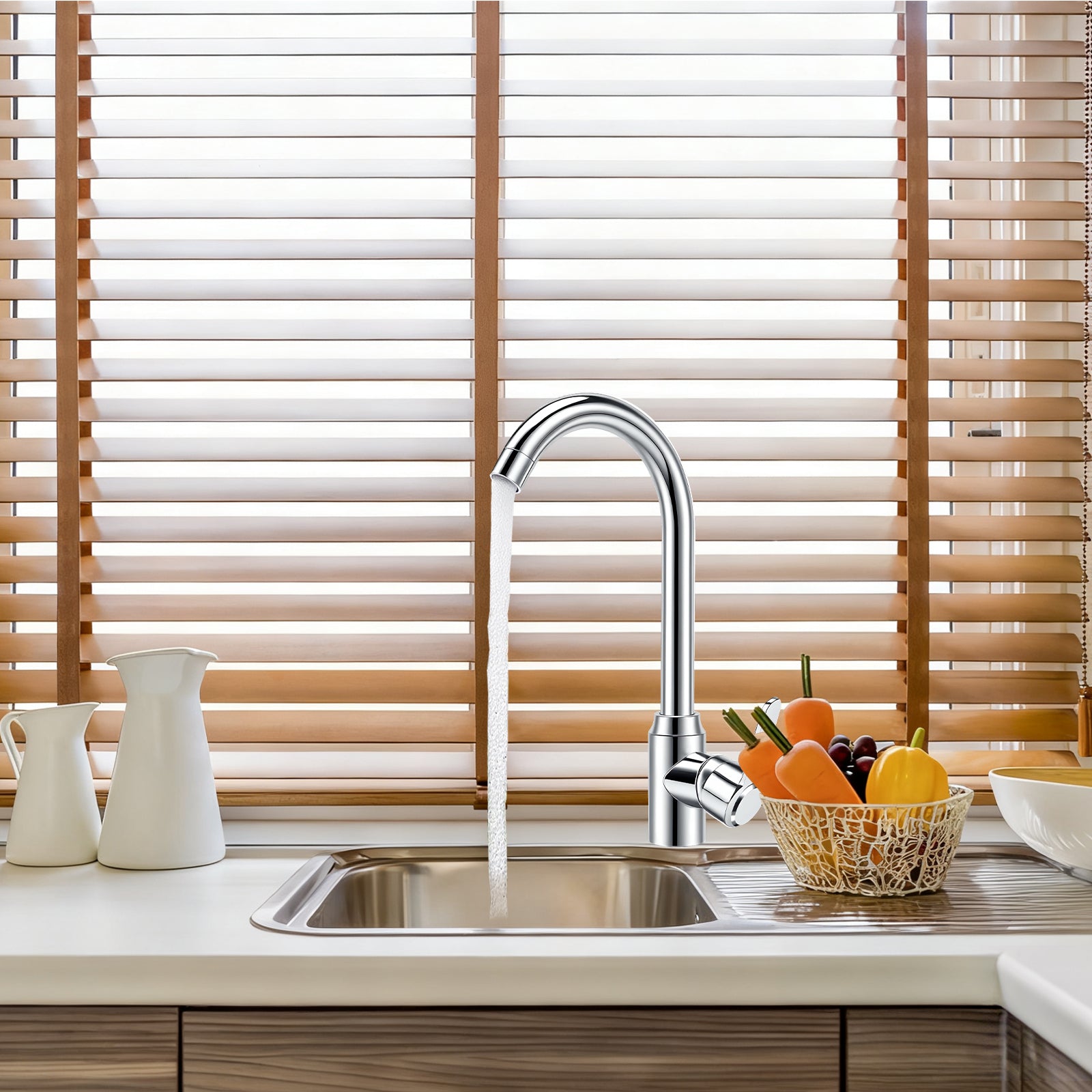 Modern kitchen sink with faucet and wooden blinds in the background