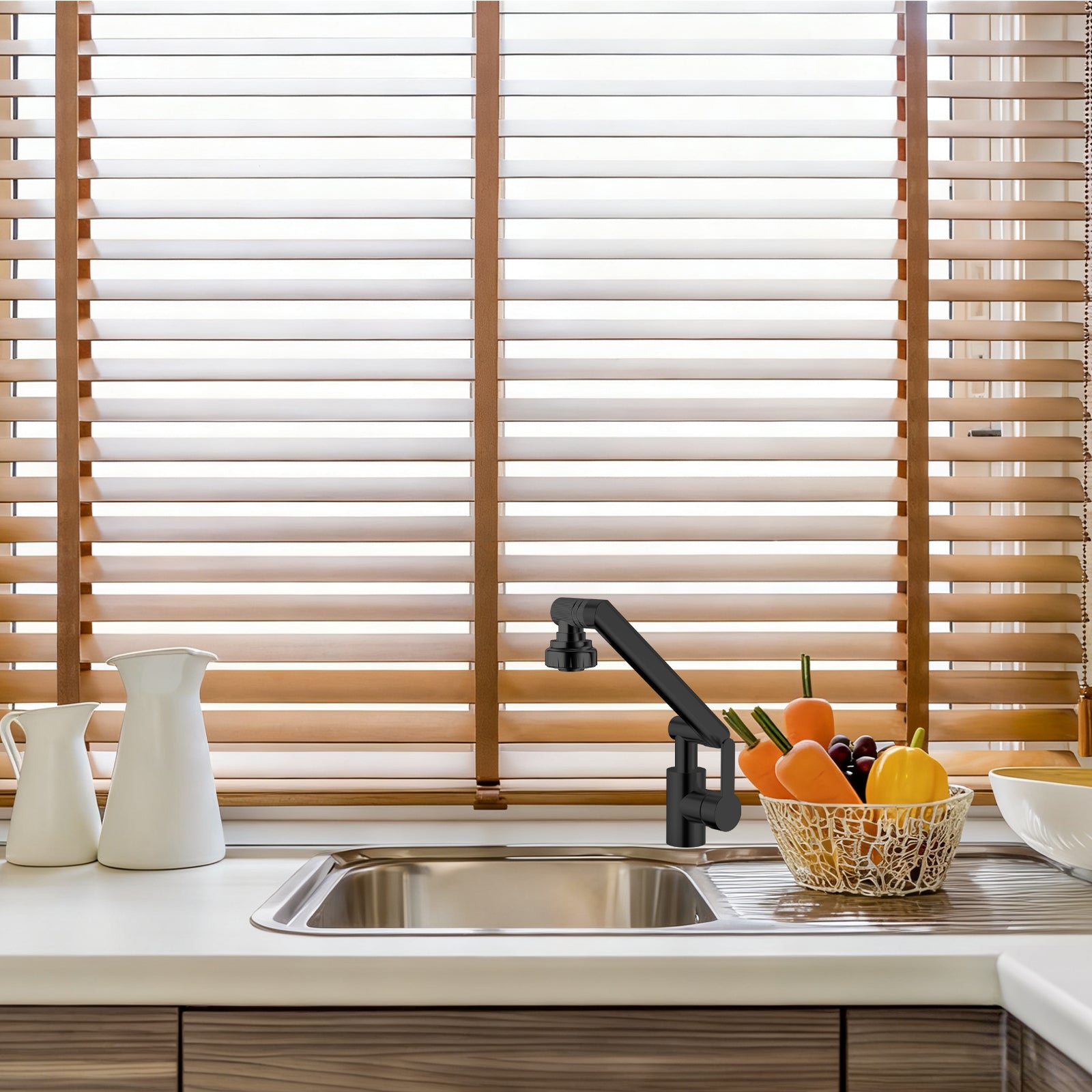 Kitchen sink with wooden blinds in the background