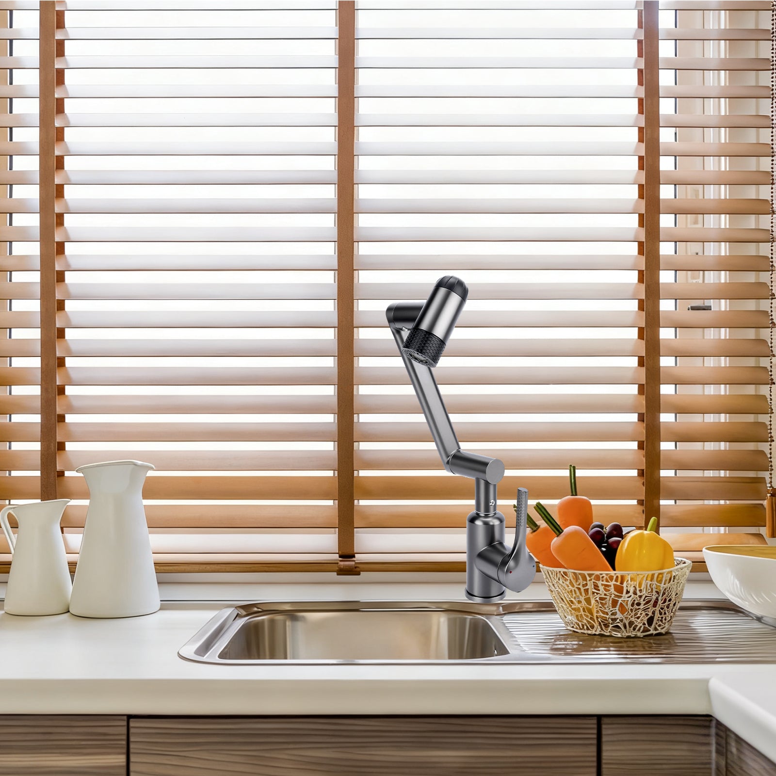 Kitchen sink with faucet and wooden blinds in the background