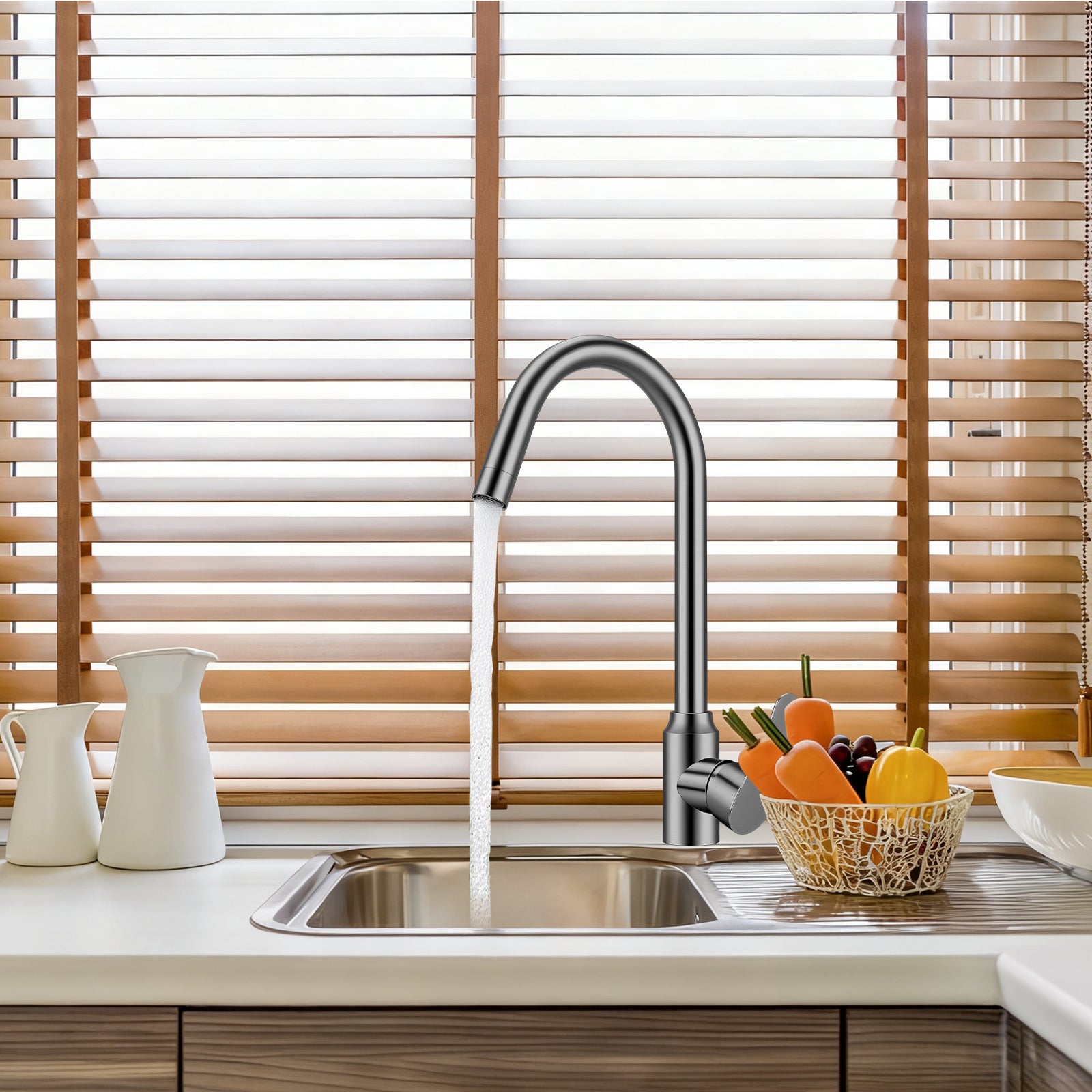 Modern kitchen sink with faucet and wooden blinds in the background
