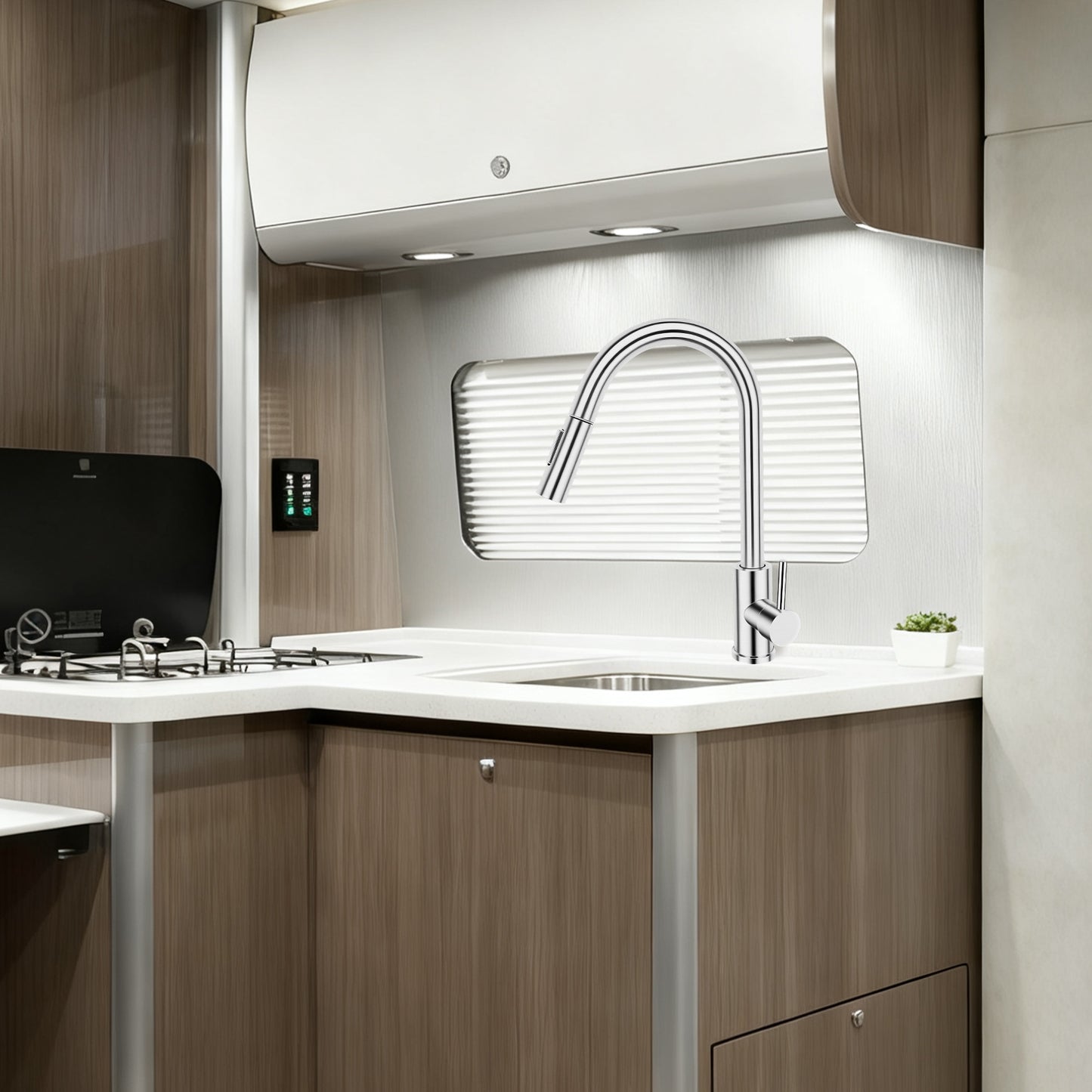 Modern kitchen with sink, faucet, and wooden cabinets