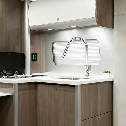 Modern kitchen with sink, faucet, and wooden cabinets