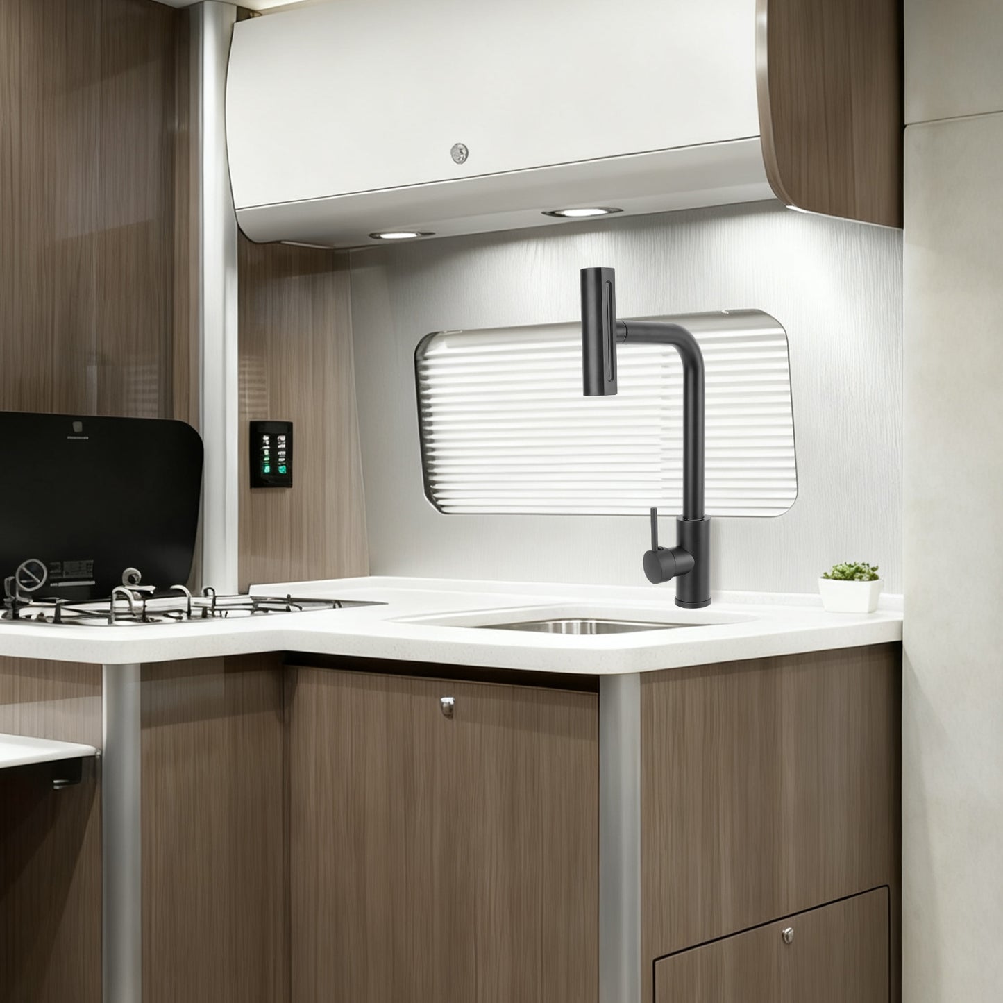Modern kitchen interior with wooden cabinets, white countertop, and black faucet.