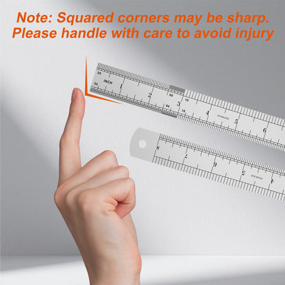 Hand holding a ruler with a warning about squared corners being sharp on a gray background